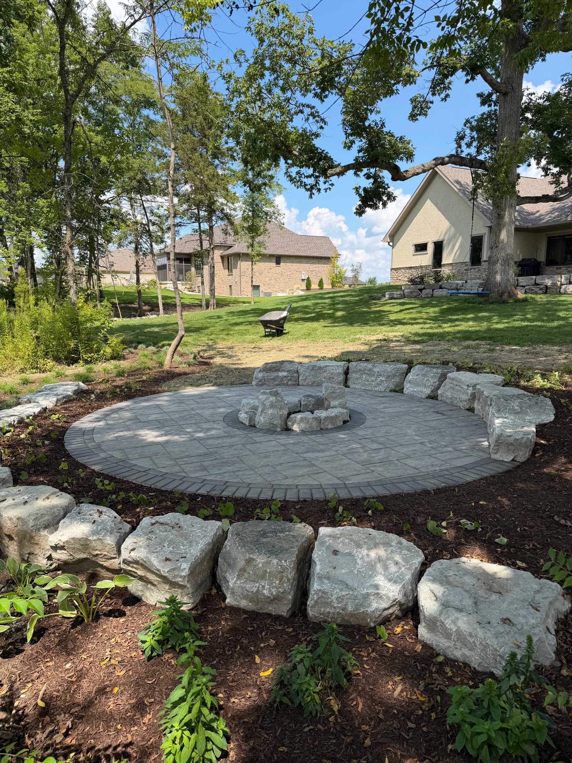 Gallery photos for Unilock Paver Patio with Limestone Boulder Fire Pit Area in Troy Ohio: Image #3