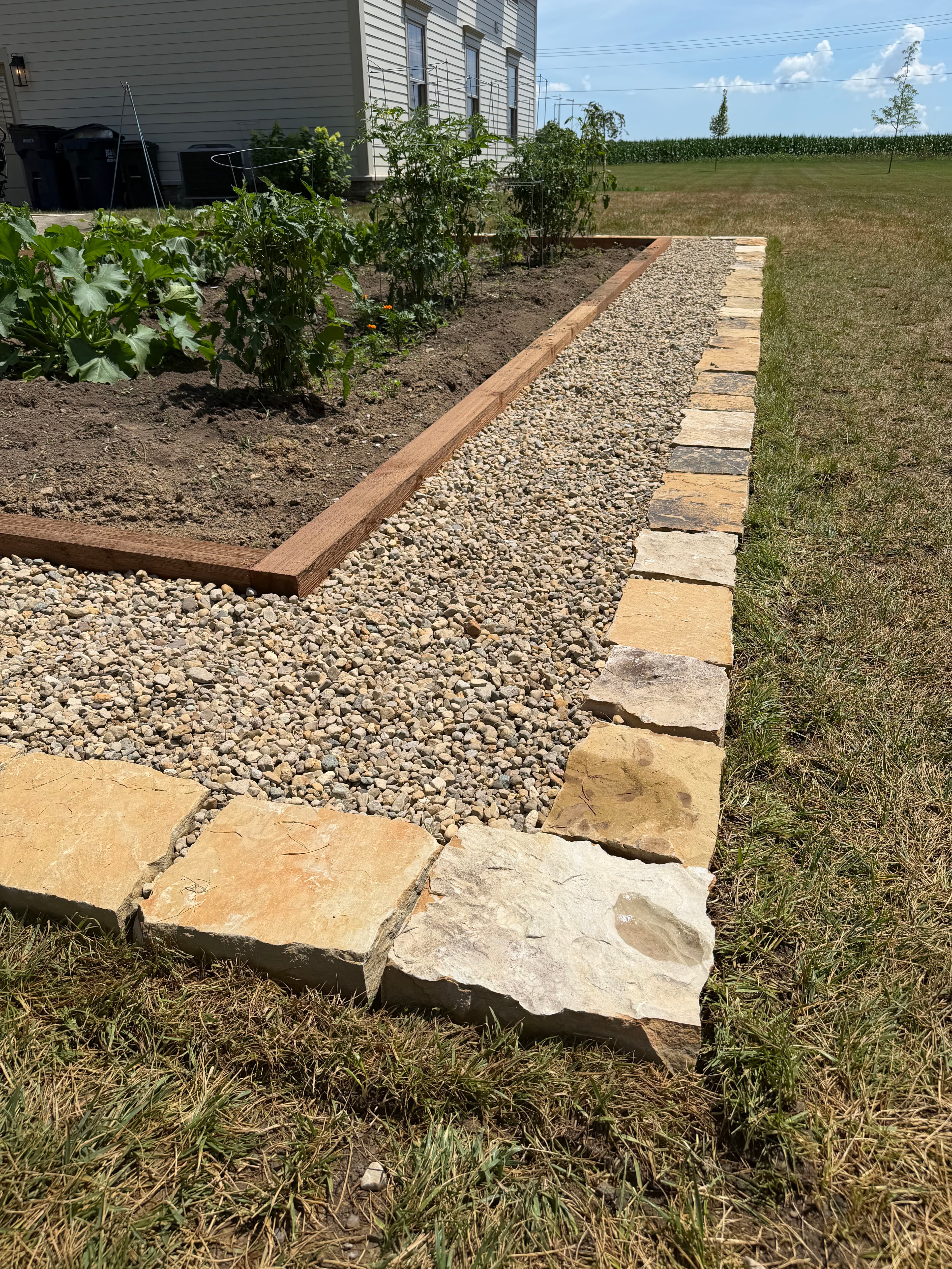Project Cedar Raised Beds and Stone Edging Make This Garden Actually Work image