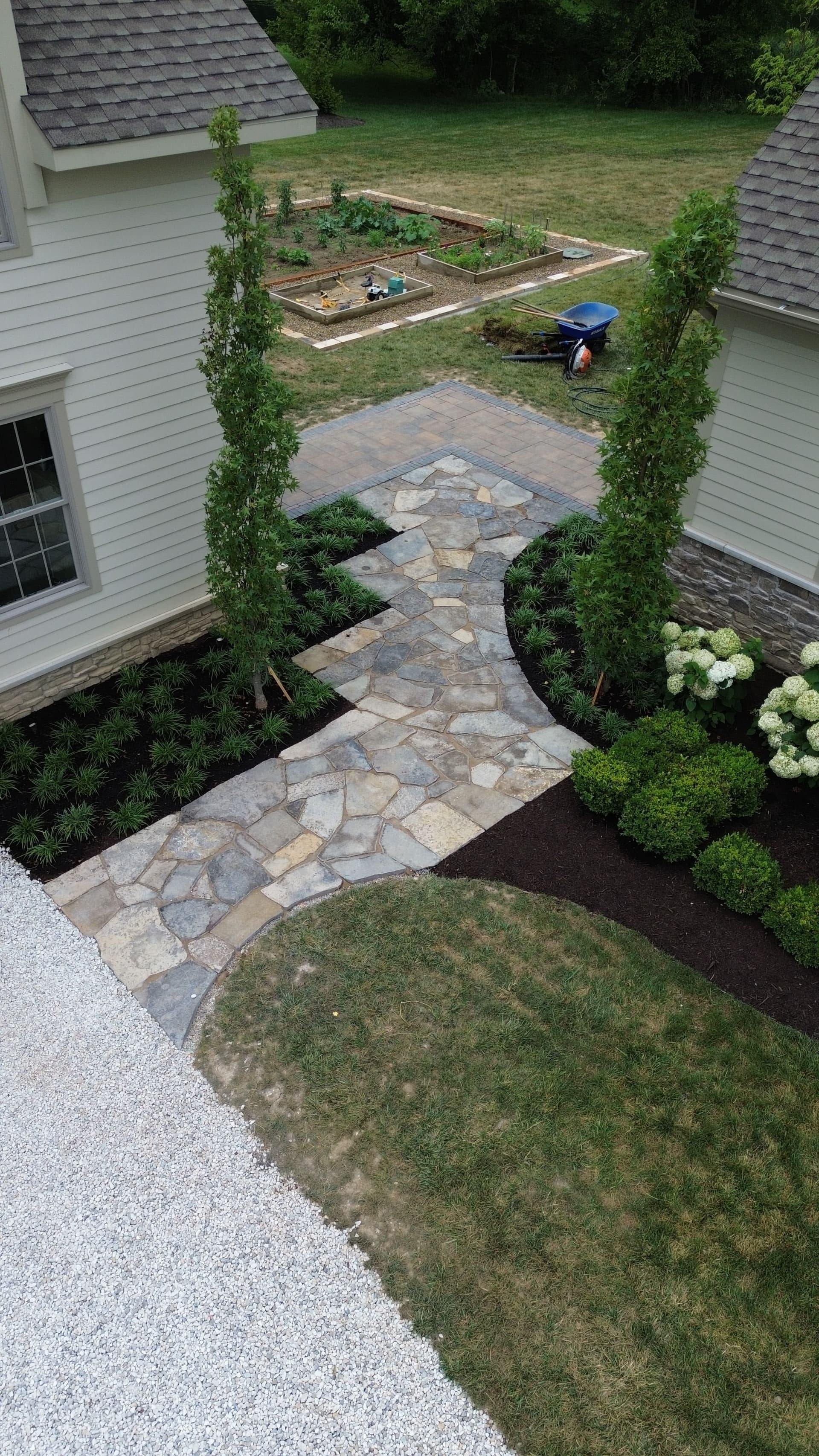 Stonework, Planting Beds, and a Garden Area Done Right image