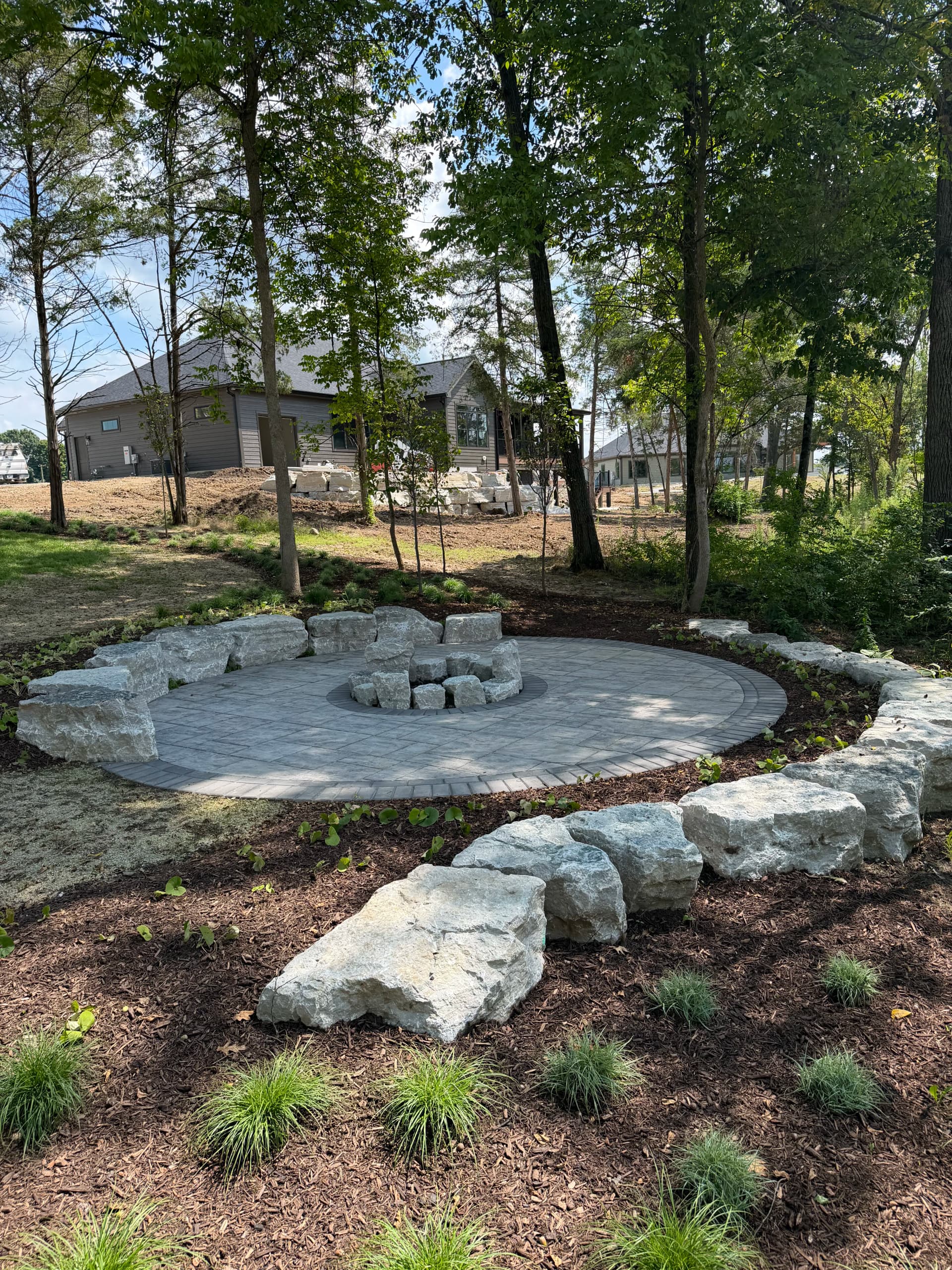 Gallery photos for Unilock Paver Patio with Limestone Boulder Fire Pit Area in Troy Ohio: Image #4
