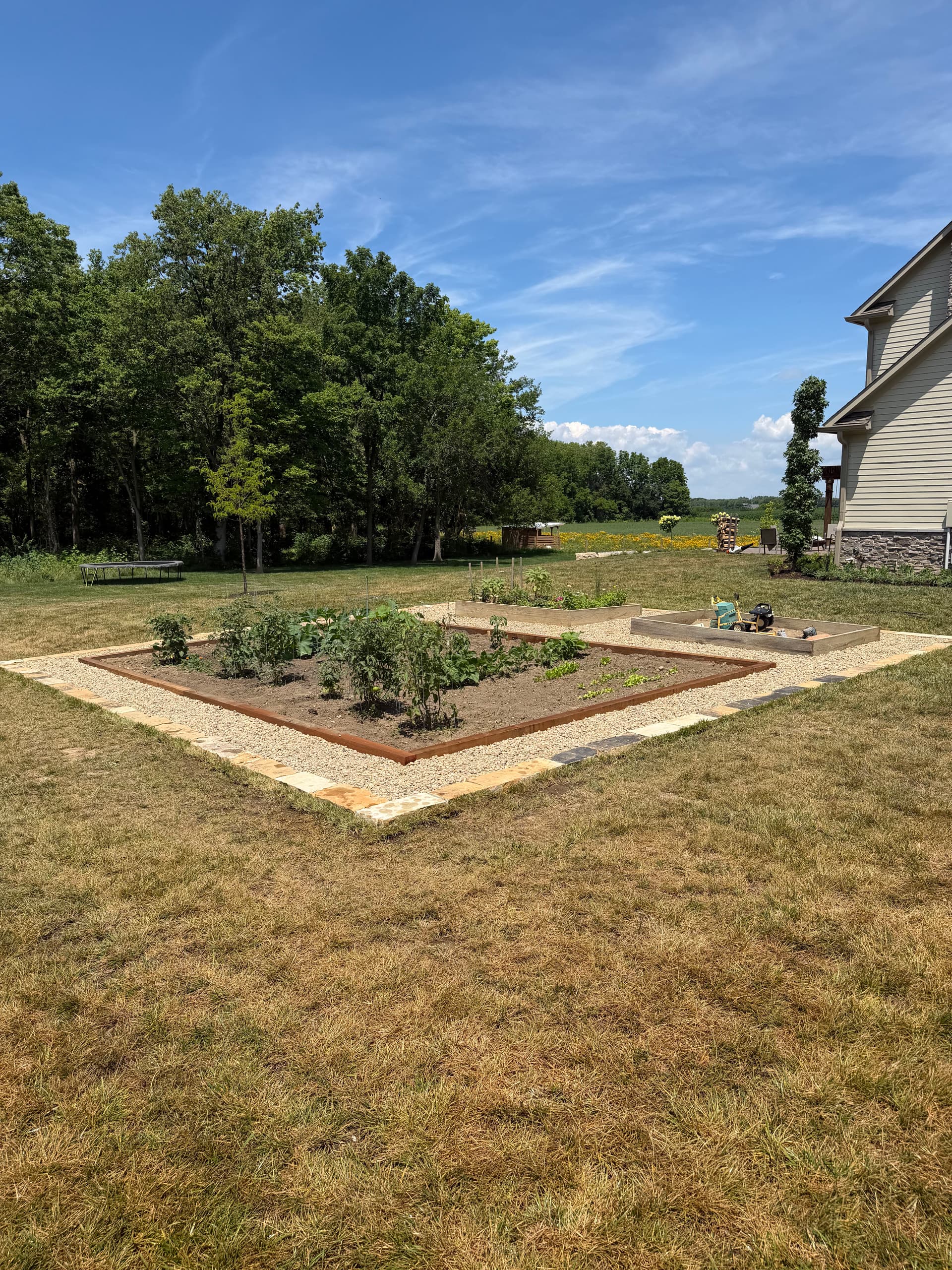 Gallery photos for Cedar Raised Beds and Stone Edging Make This Garden Actually Work: Image #2