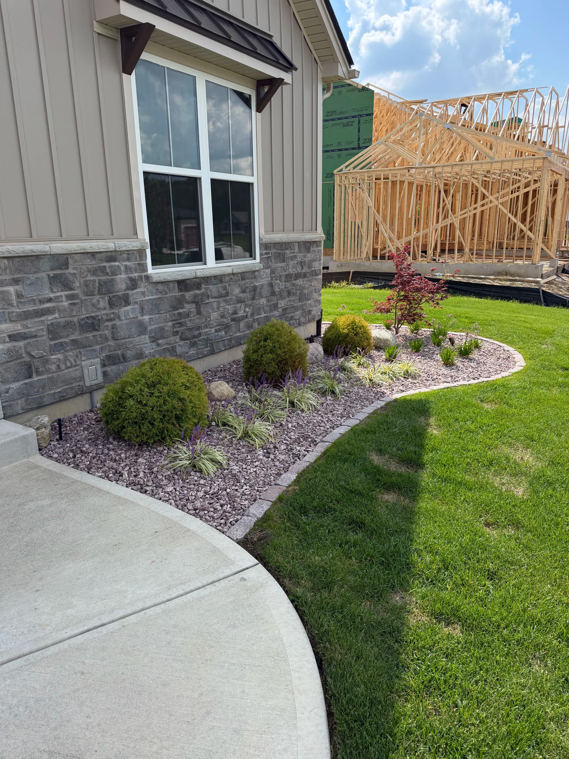 Gallery photos for Stone Edging, Fresh Plantings and Rock Beds in Centerville: Image #2