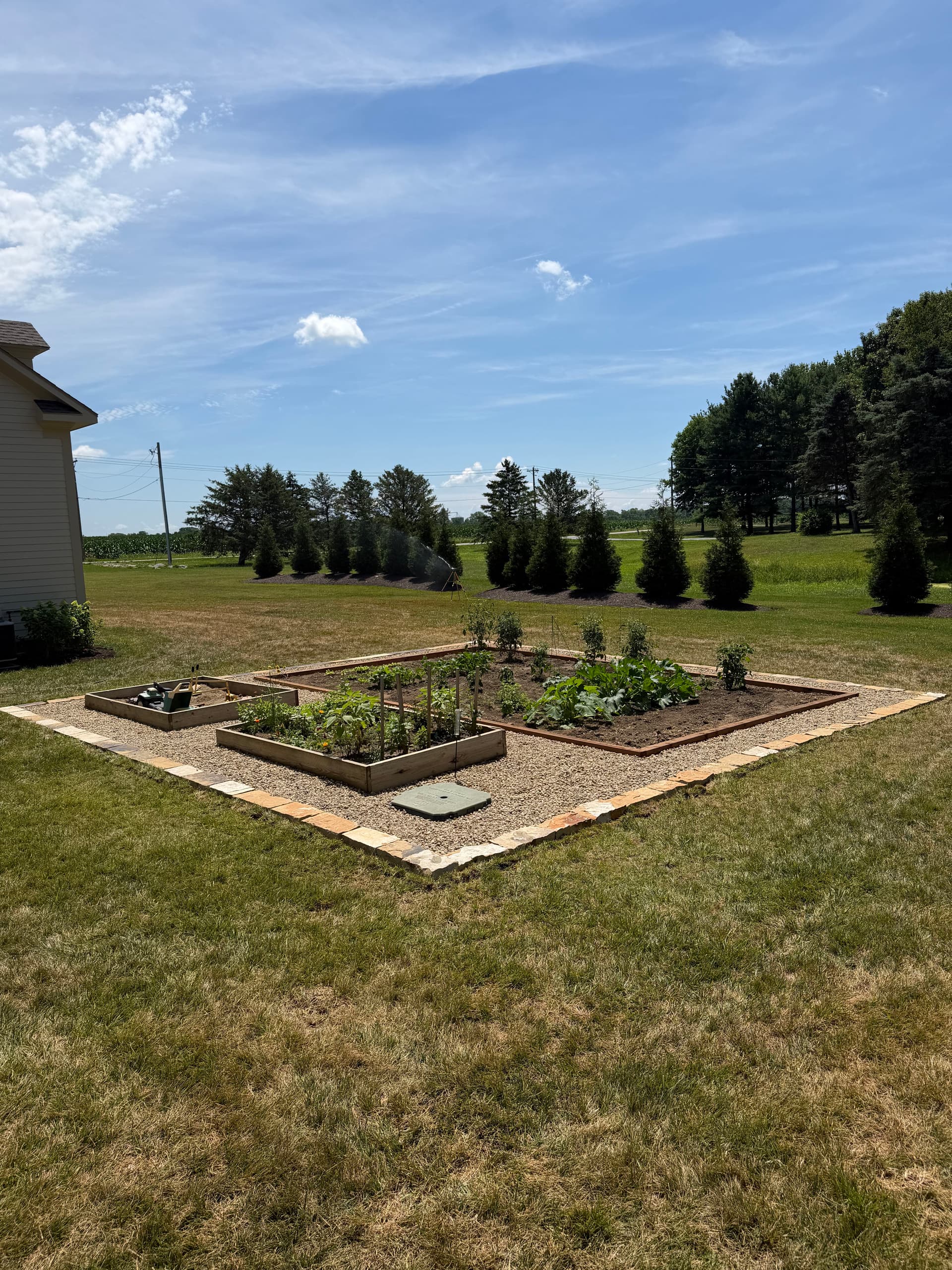 Gallery photos for Cedar Raised Beds and Stone Edging Make This Garden Actually Work: Image #1